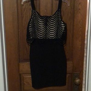 Plain black dress with pretty simple detail